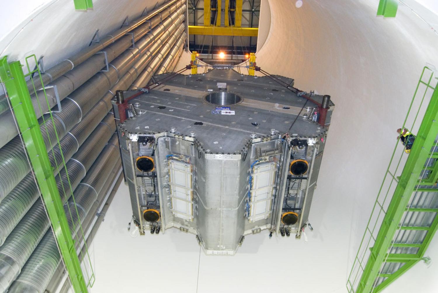 The complex and spectacular lowering into the cavern of the huge
